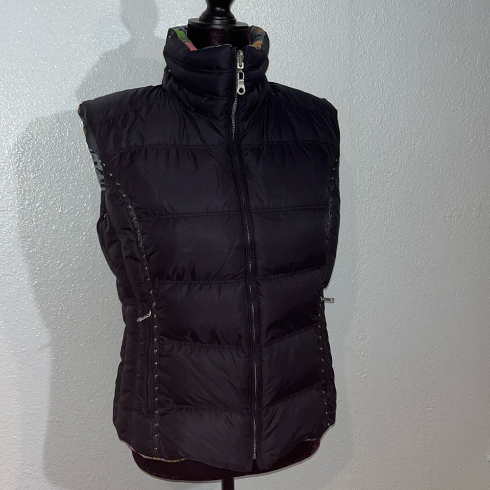A diamond in the snow down filled reversable vest